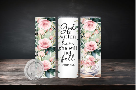 Two tumblers with floral designs and a motivational quote on a wooden surface.